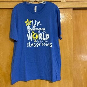 Canvas graphic T-shirt, blue ”the future of the world is in our classroo…
